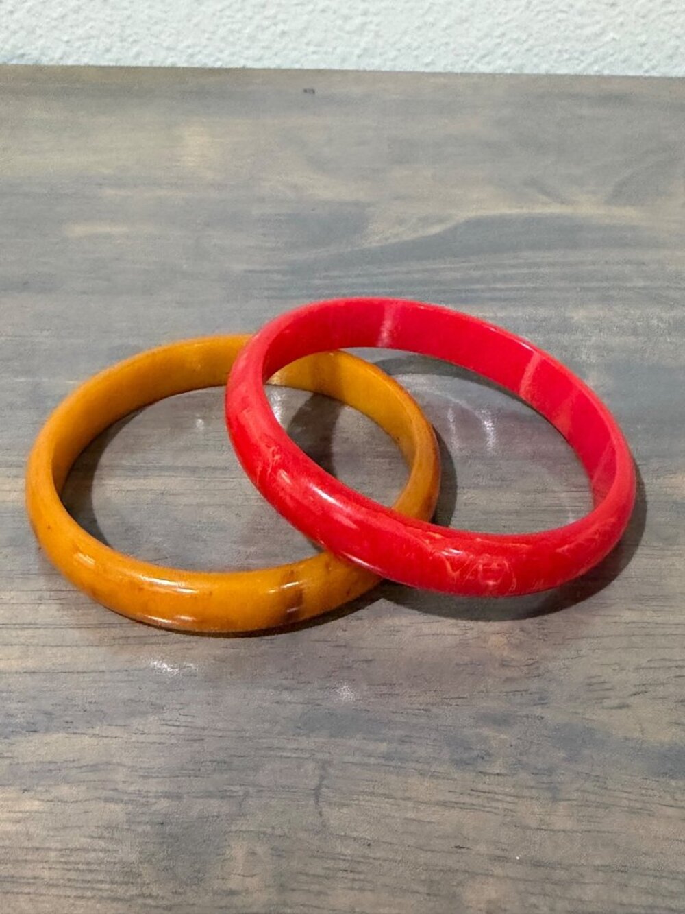 2 Vintage Marbled Yellow and Cherry Red Bakelite Bangle Bracelets